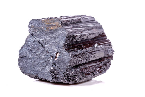 istock macro mineral stone sherle, schorl, black tourmaline on white background 1045444664