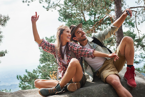 Couple making a selfie during hiking trip