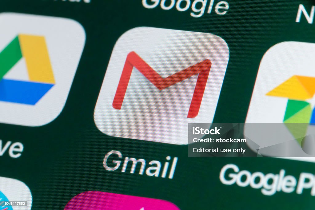Gmail, Google Drive, Google Photos and other Apps on iPhone screen London, UK - July 31, 2018: The buttons of the app Gmail, surrounded by Google, Google Photos, Google Drive and other apps on the screen of an iPhone. E-Mail Stock Photo