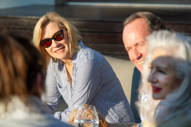 istock Outdoor Group Enjoying Wine 1045447982
