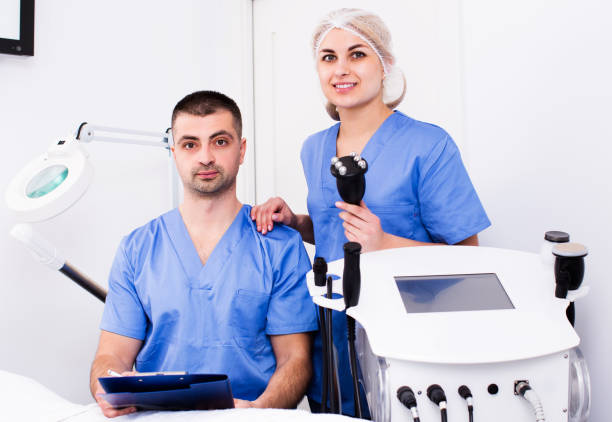 istock Two confident beauticians working in clinic 1045470240