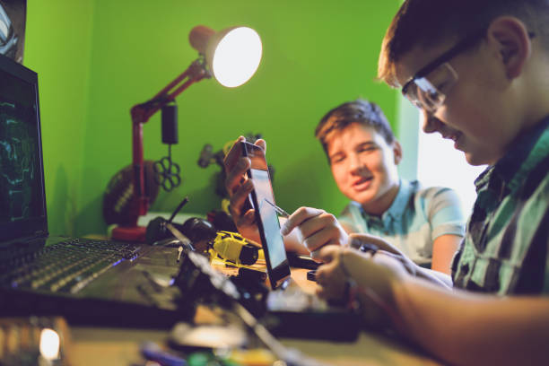 istock Little engineers! Look at this man, this will be a new and better version 1045473146