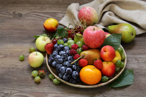 istock different berries and fruits 1045473198