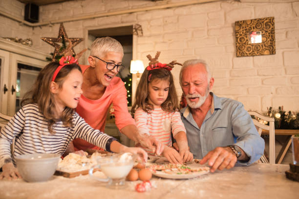 istock Happy family baking cookies together 1045473490