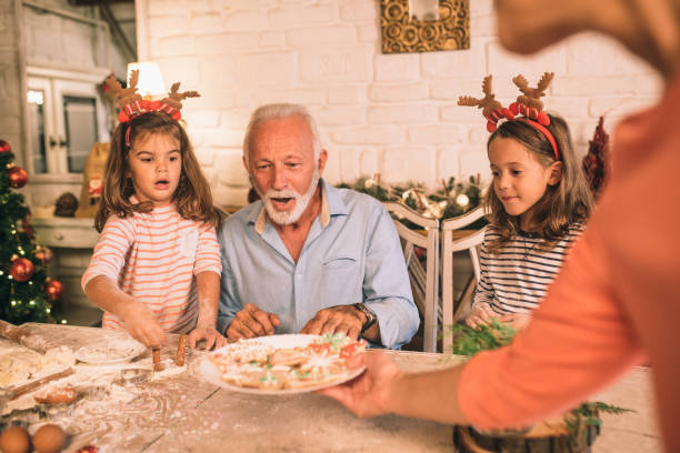 istock Surprised people looking at Christmas cookies 1045473936