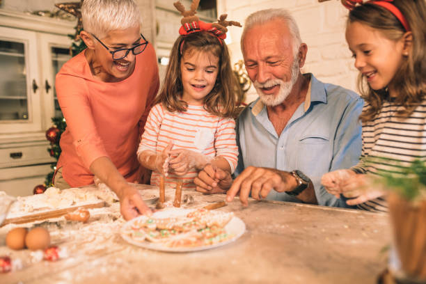 istock Happy family playing with cake ingredients 1045474136