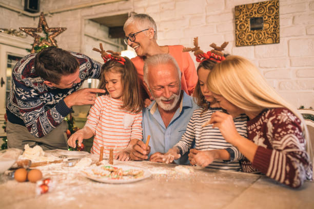 istock Joyful family preparing food 1045476588