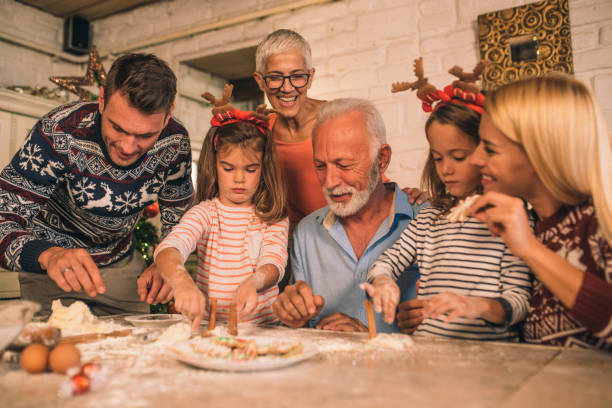istock Jolly family making Christmas cake 1045476620