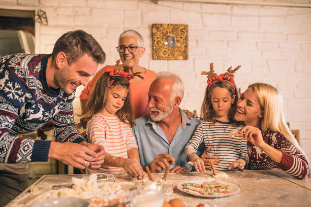 istock Multi-generation family making cookies together 1045476650