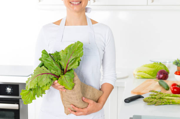 istock Woman Cooking 1045483292