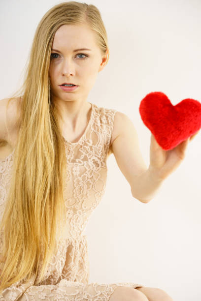 istock Sad woman on Valentines day 1045491750