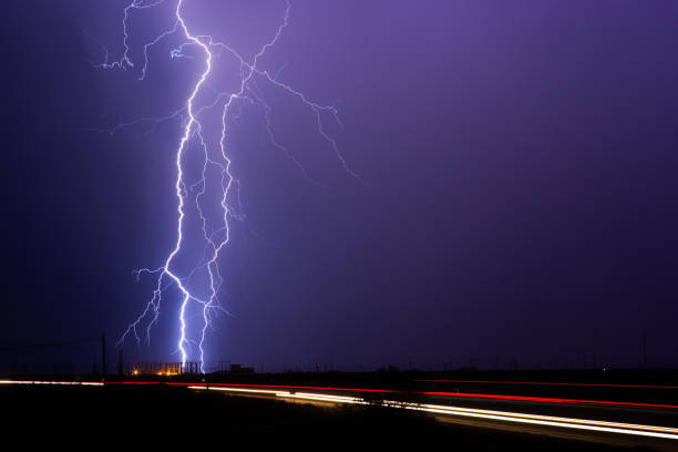 istock Lightning bolt strikes an electrical substation during a storm. 1045492486