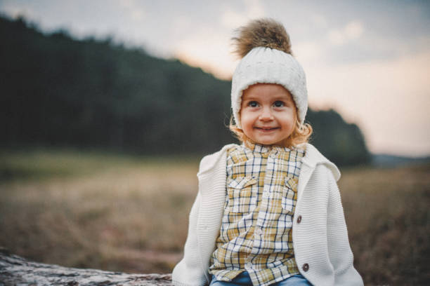 istock Cute little girl in woods 1045492496