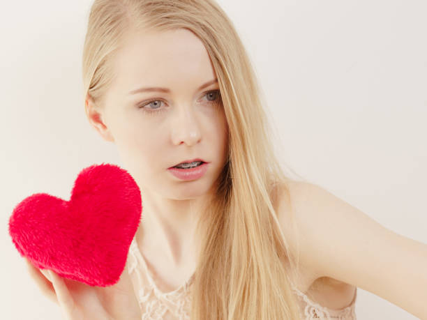 istock Sad woman on Valentines day 1045492770