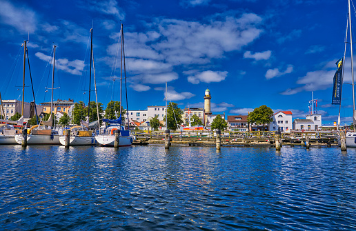 View to the port and old lighthouse in Warnemünde, Rostock, Germany.