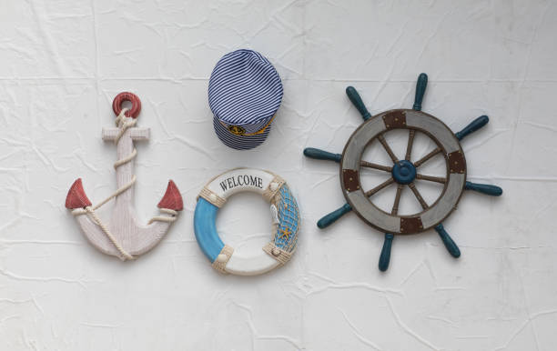 istock marine concept, ship steering wheel on white background 1045495680