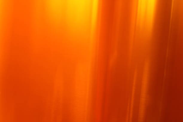 istock Abstract background - light flashes, rays and reflections on Yellow background. Motion blur. 1045496902