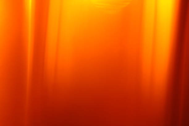 istock Abstract background - light flashes, rays and reflections on Yellow background. Motion blur. 1045496914