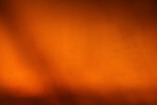 istock Abstract background - light flashes, rays and reflections on Yellow background. Motion blur. 1045496962