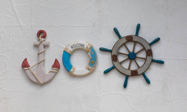 istock Vintage wooden ship's wheel on white background 1045497044