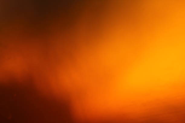 istock Abstract background - light flashes, rays and reflections on Yellow background. Motion blur. 1045497062