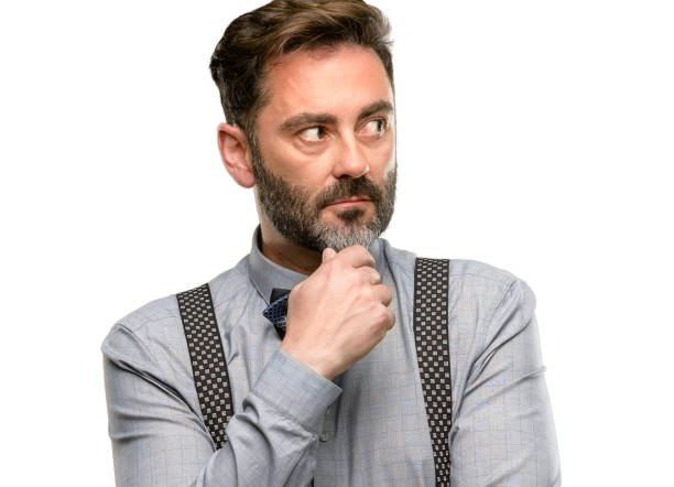 istock Middle age man, with beard and bow tie doubt expression, confuse and wonder concept, uncertain future 1045499550