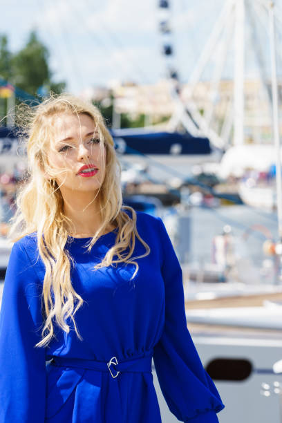 istock Fashion model wearing blue jumpsuit 1045505494