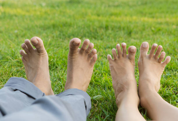 istock Couple Relax barefoot enjoy nature 1045516458
