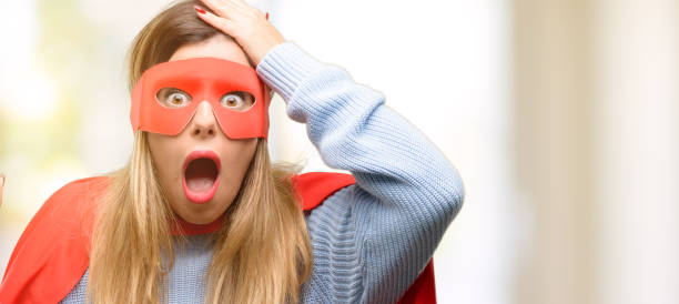 istock Young super woman pointing away side with finger 1045523182