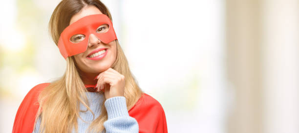 istock Young super woman thinking and looking up expressing doubt and wonder 1045523202