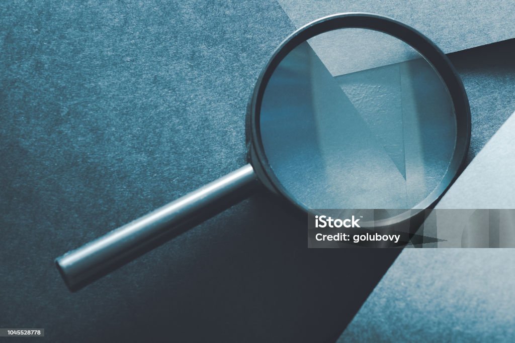 Magnifying Glass Comparison Assessment Analysis Stock Photo - Download