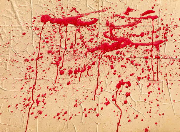 istock stains of red paint on a white dirty rough old abstract background 1045529850