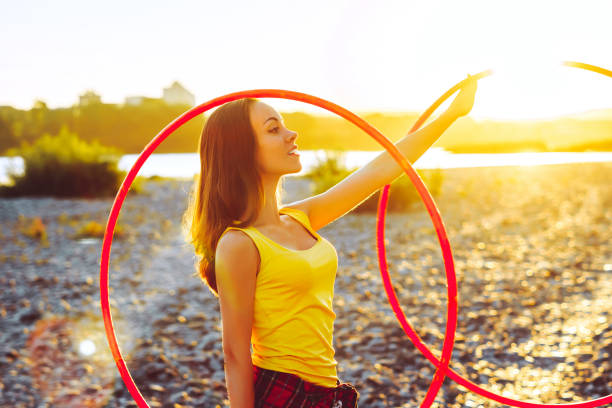 istock girl with hoops in nature 1045533276