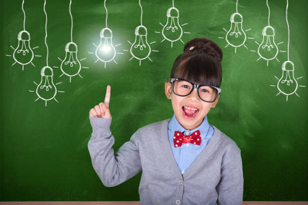 istock Little Asian teacher showing school education concept 1045537224