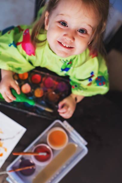 istock Girl Painting 1045539460