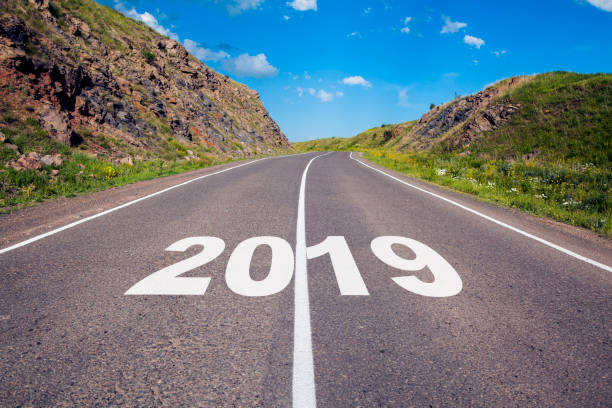 istock asphalt road and New year 2019 concept. 1045540468