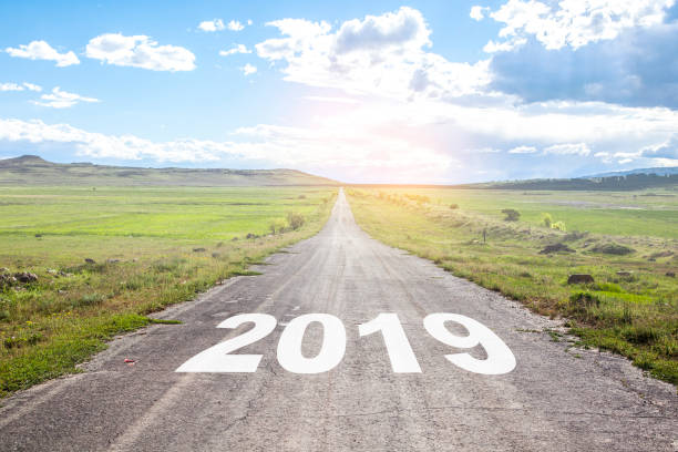 istock asphalt road and New year 2019 concept. 1045540486