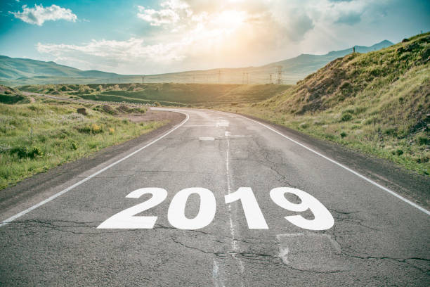 istock asphalt road and New year 2019 concept. 1045540514