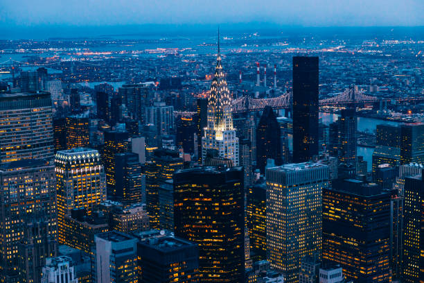 istock New York skyline through Empire State Building at dusk 1045542798