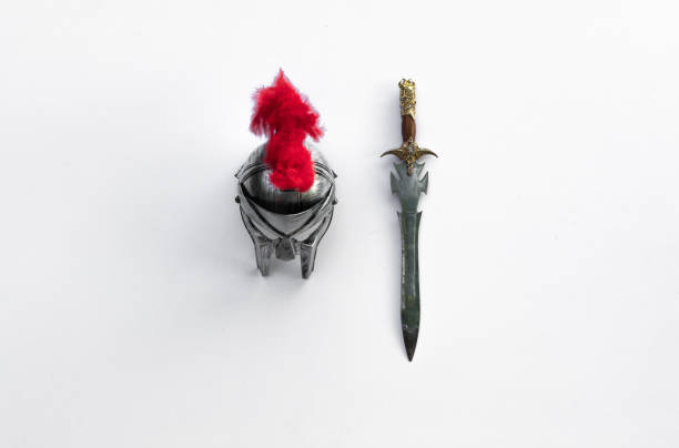 istock ancient medieval military weapon on a white background,shield and sword 1045546796
