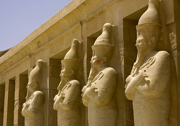 Row of Statues at Deir El-Bahari, Egypt.  el bahari stock pictures, royalty-free photos & images