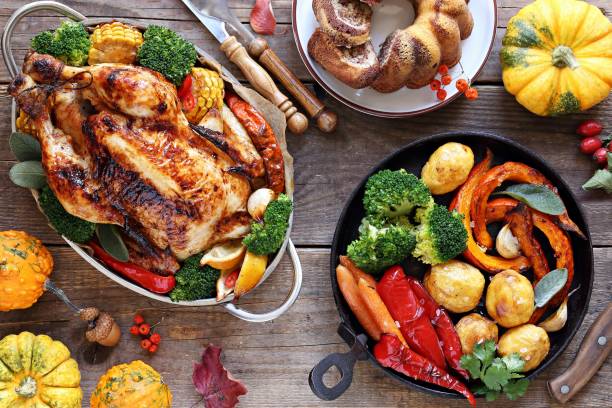 istock Roasted chicken or turkey with vegtables and herbs 1045555682
