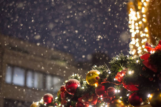 istock Beautiful illumination at the Christmas market during a snowfall 1045565178
