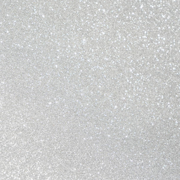 istock white and silver abstract bokeh lights. defocused background bling blur for christmas 1045568132