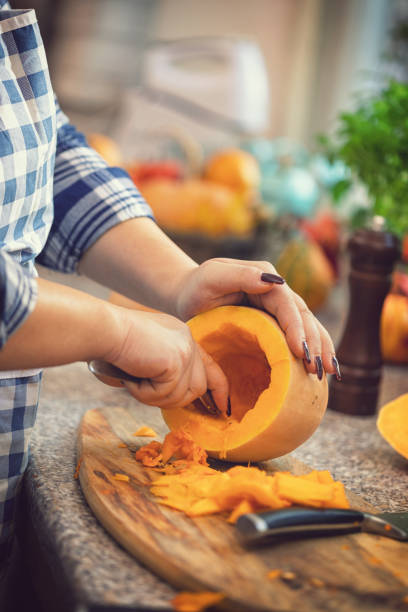 istock Preparing Pumpkin soup at home 1045568256