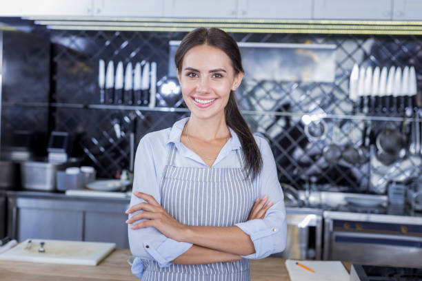 istock Beautiful attractive woman posing in the kitchen 1045574684