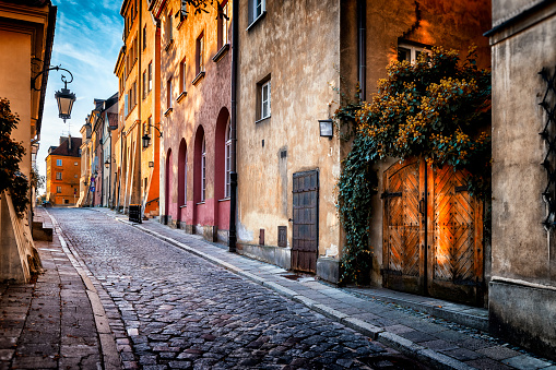 Autumn view of the birch street in the morning in Warsaw's Old Town, Poland