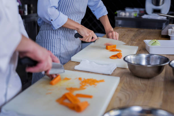 istock Experienced cooks cooking a wonderful dish together 1045580432