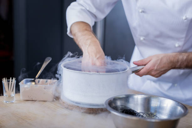 istock Good cook showing his skills in molecular gastronomy 1045580506
