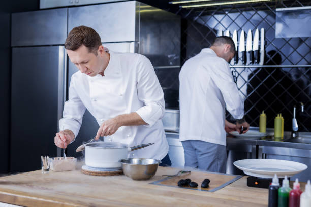 istock Great cooks working in the kitchen together 1045580540